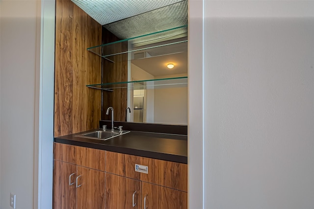 bar with a sink and wet bar