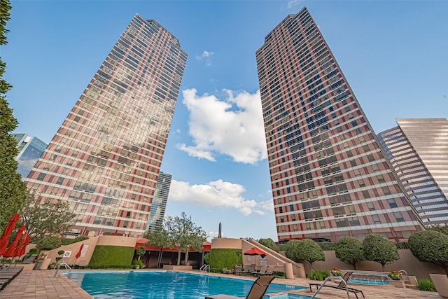 community pool featuring a patio