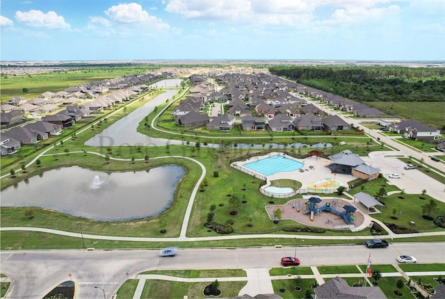 aerial view featuring a residential view and a water view