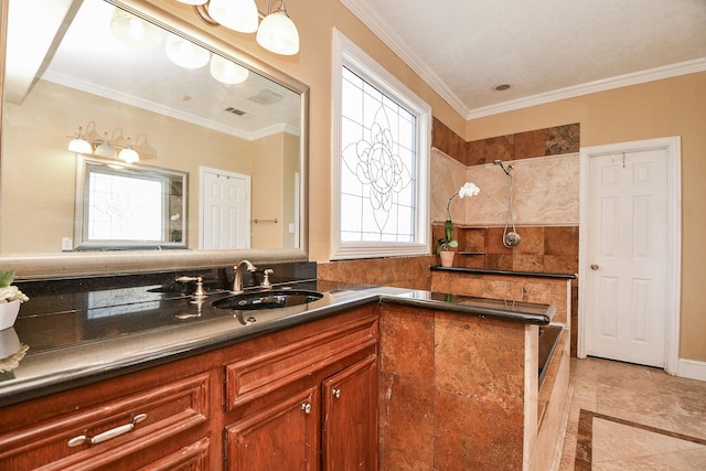 full bathroom featuring tiled shower, vanity, and ornamental molding