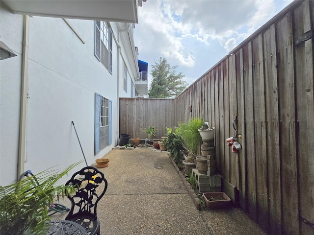 view of patio featuring a fenced backyard