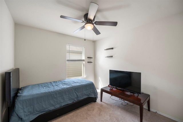 carpeted bedroom featuring a ceiling fan