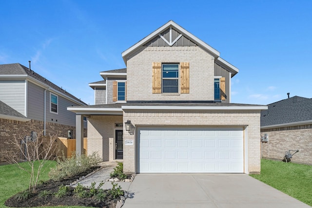 view of front of property featuring a garage, brick siding, and driveway