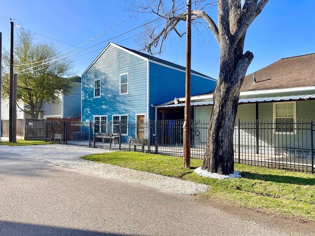 view of front of home featuring a gate and a fenced front yard