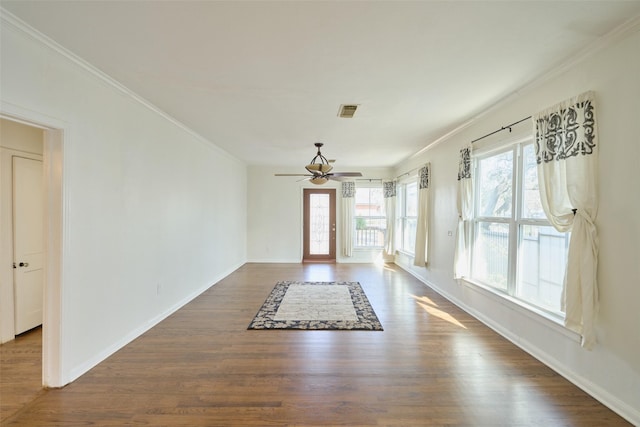 1111 Rutland St, Houston, TX 77008 - interior space with a ceiling fan, visible vents, dark wood-type flooring, and crown molding