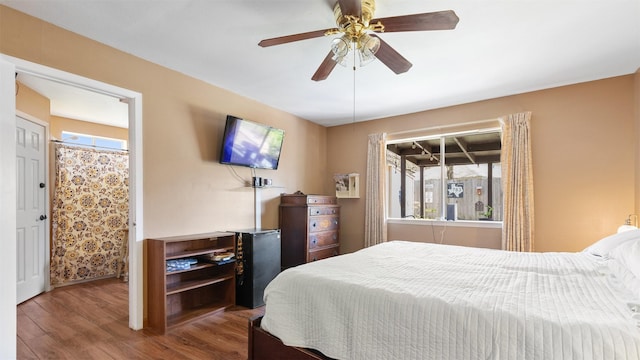 bedroom featuring ceiling fan and wood finished floors