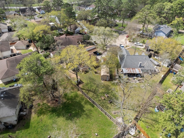 birds eye view of property with a residential view