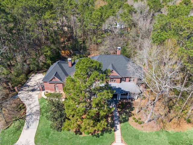 drone / aerial view with a forest view