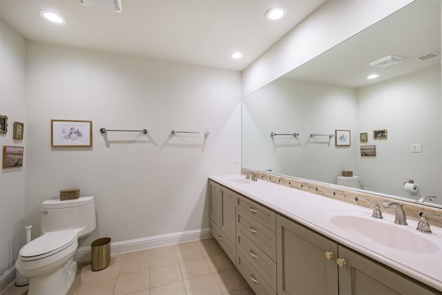 full bath with tile patterned flooring, recessed lighting, toilet, and a sink