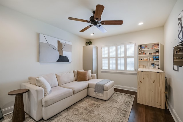 living room with dark wood-type flooring, recessed lighting, baseboards, and ceiling fan