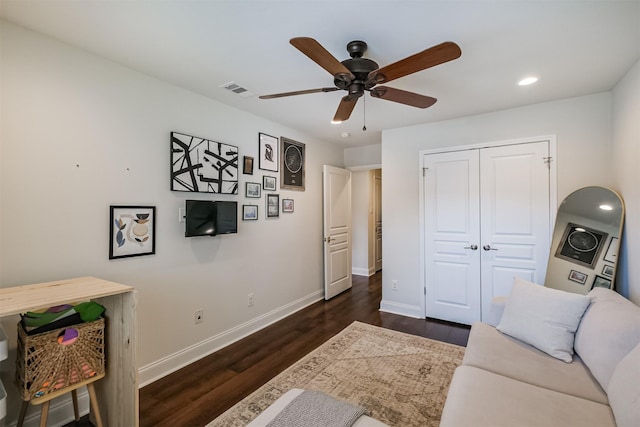 interior space featuring visible vents, dark wood-type flooring, baseboards, recessed lighting, and a ceiling fan