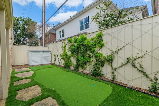 view of yard with a fenced backyard