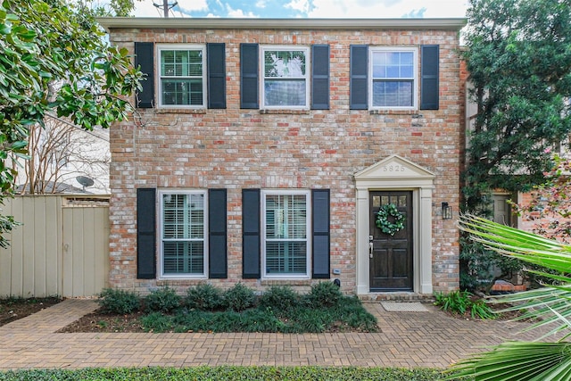 view of front of home with brick siding