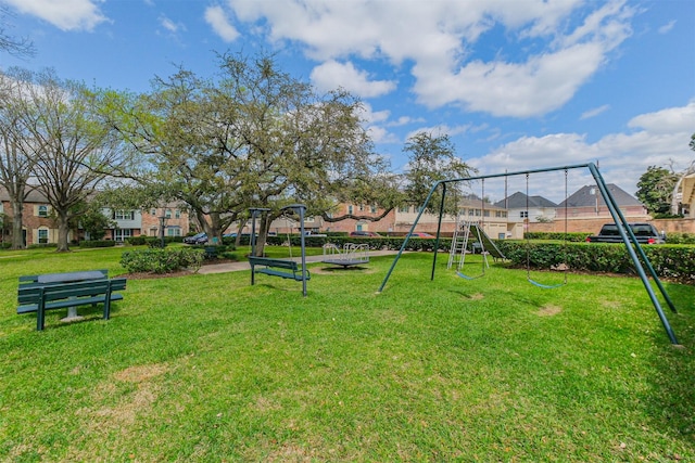 exterior space with a yard and a residential view