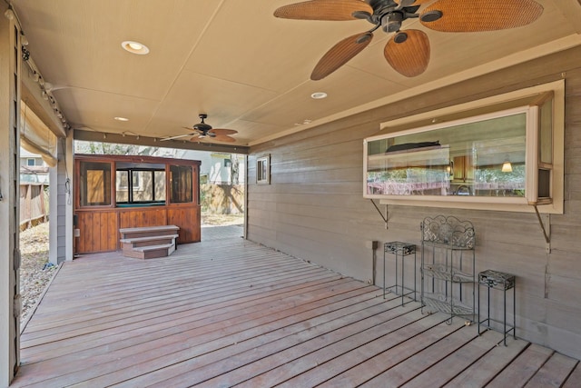 deck with a ceiling fan