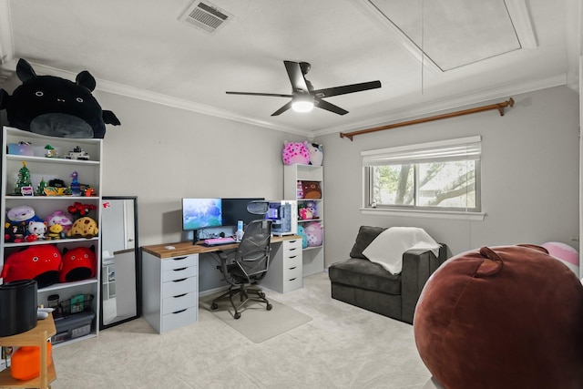 office area featuring visible vents, light carpet, attic access, and crown molding