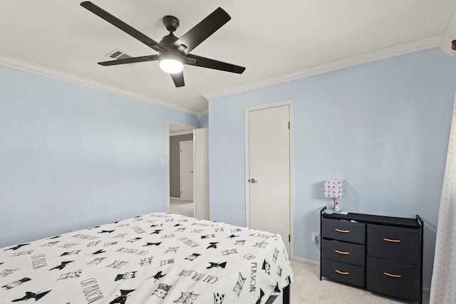 bedroom with a ceiling fan, crown molding, light colored carpet, and visible vents