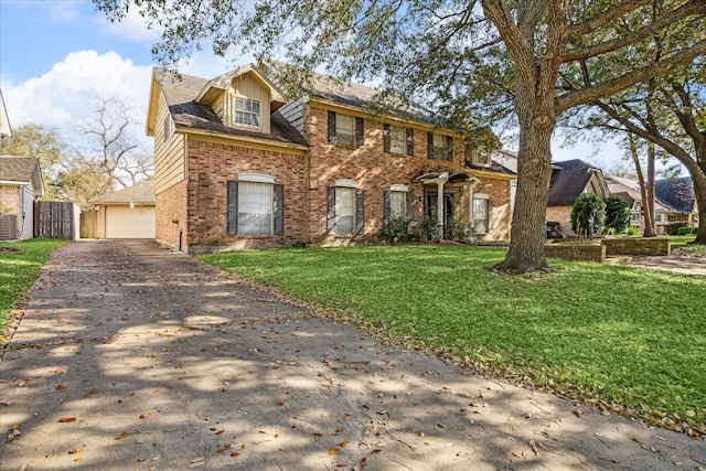 colonial house with brick siding, a front lawn, fence, central air condition unit, and a garage