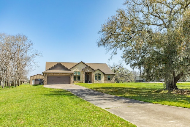 view of front facade with stone siding, a garage, driveway, and a front lawn