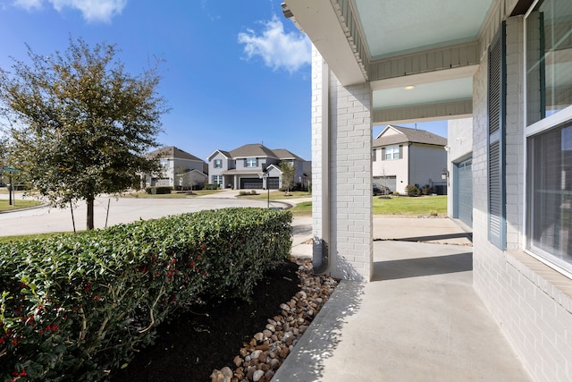 view of patio / terrace with a residential view