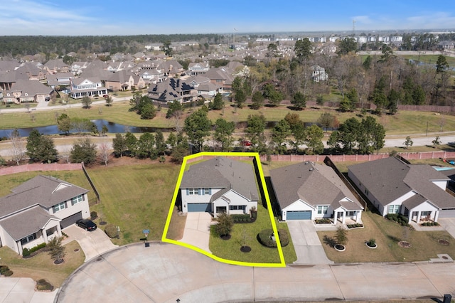 aerial view featuring a residential view and a water view