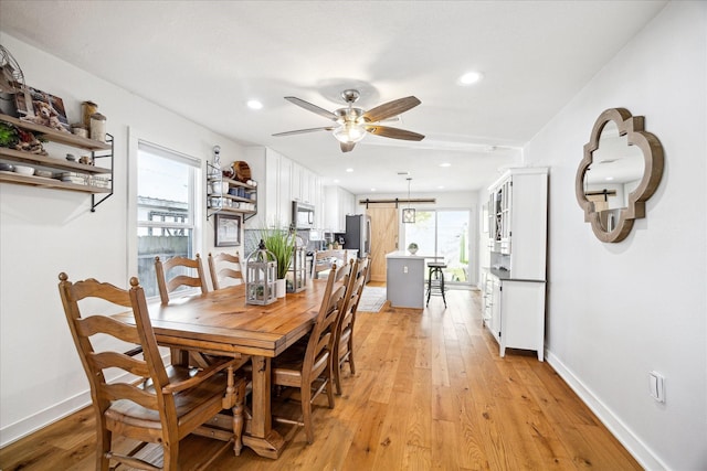 dining room with recessed lighting, baseboards, light wood-style flooring, and a ceiling fan