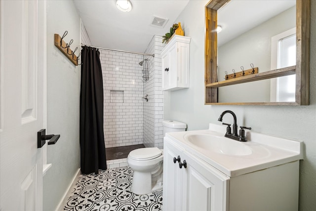 full bathroom with tile patterned floors, visible vents, toilet, a shower stall, and vanity