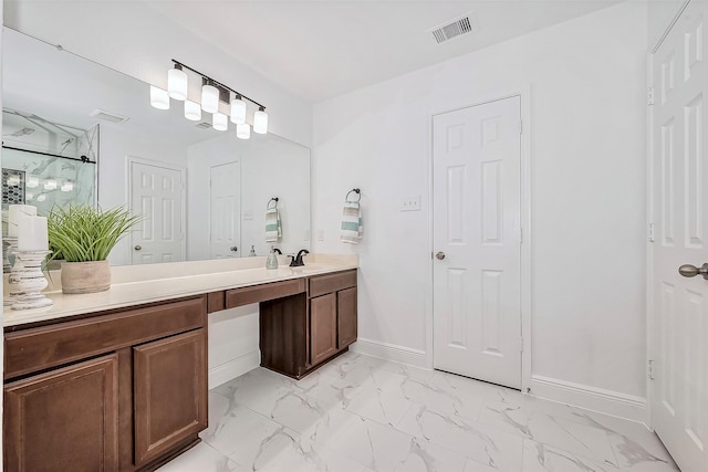 bathroom featuring visible vents, marble finish floor, a shower stall, baseboards, and vanity