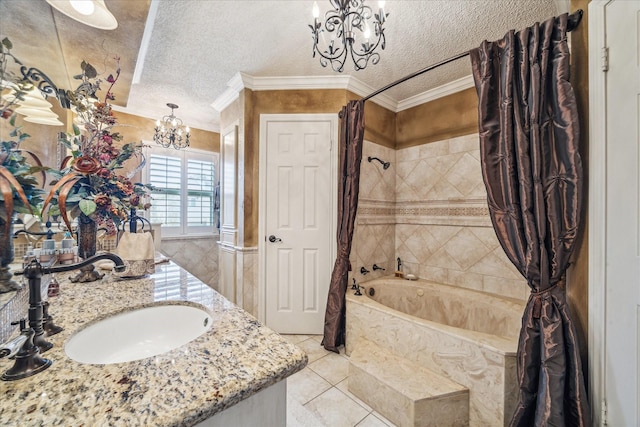 bathroom with crown molding, a chandelier, double vanity, a textured ceiling, and a sink