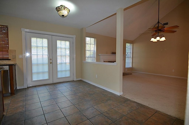 doorway to outside featuring lofted ceiling, french doors, carpet floors, baseboards, and ceiling fan