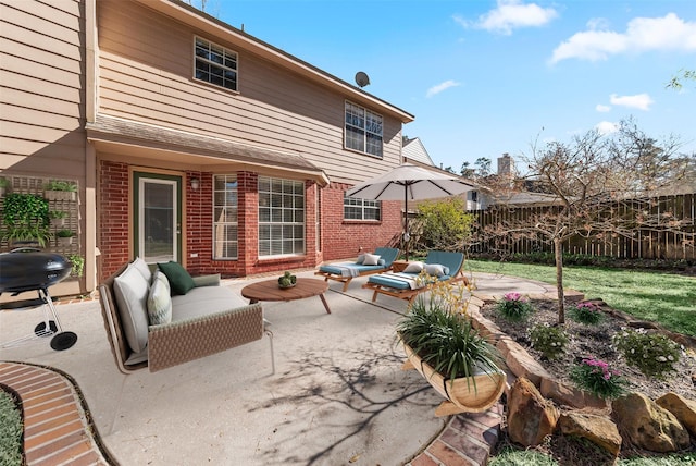 view of patio with an outdoor living space, area for grilling, and fence