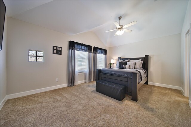 8705 Bryam St Unit 1605, Houston, TX 77061 - bedroom featuring vaulted ceiling, multiple windows, carpet flooring, baseboards, and ceiling fan