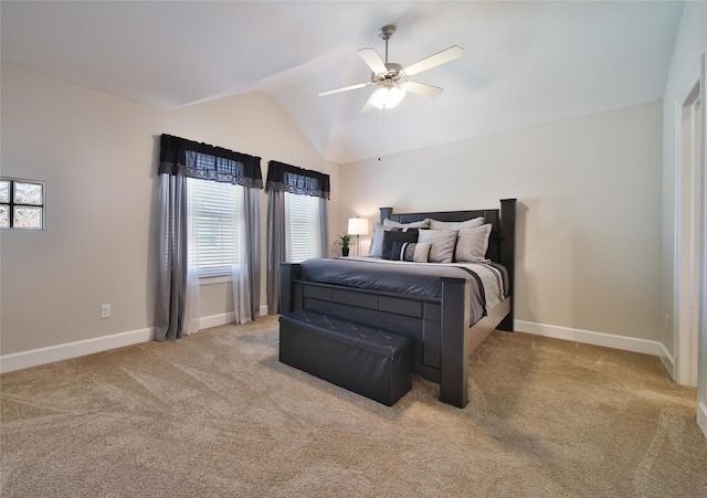 8705 Bryam St Unit 1605, Houston, TX 77061 - bedroom with multiple windows, lofted ceiling, carpet, baseboards, and a ceiling fan