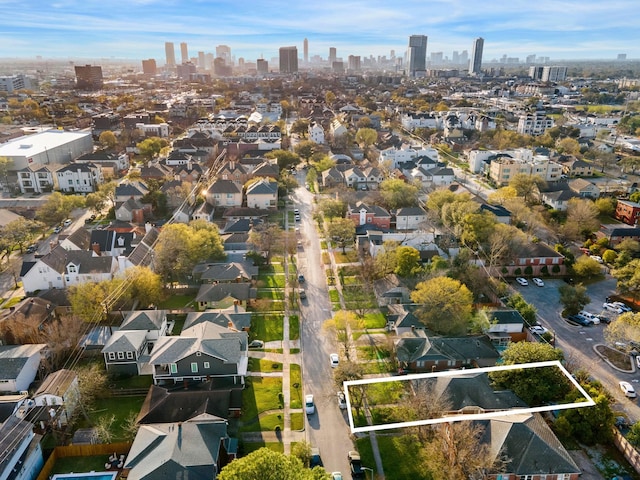 birds eye view of property featuring a view of city