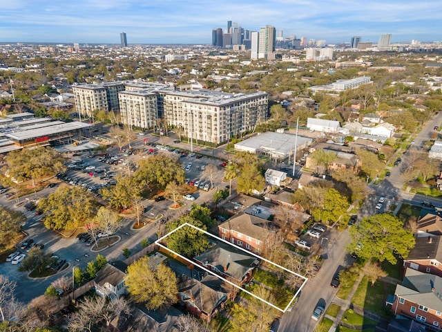 birds eye view of property with a city view