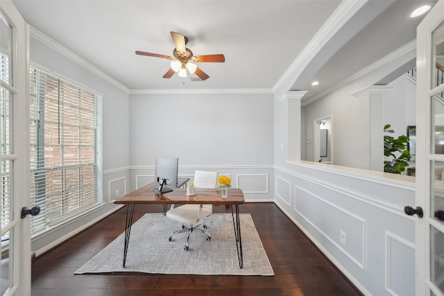 office featuring wood finished floors, ceiling fan, crown molding, and a decorative wall