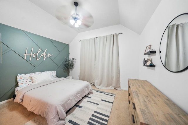 bedroom featuring vaulted ceiling, carpet flooring, and ceiling fan