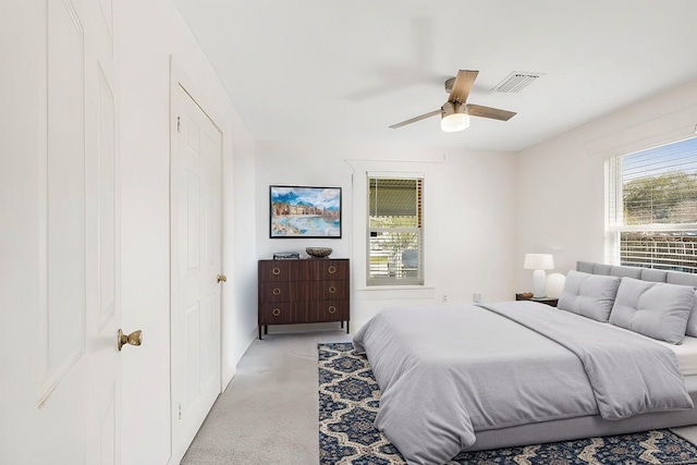 4219 Cochran St, Houston, TX 77009 - bedroom with light carpet, a ceiling fan, and baseboards