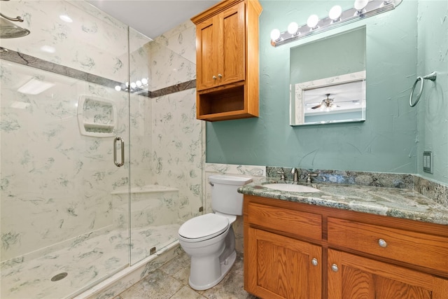 full bath with vanity, a shower stall, toilet, and tile patterned floors