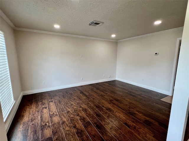 unfurnished room with baseboards, visible vents, dark wood finished floors, a textured ceiling, and crown molding