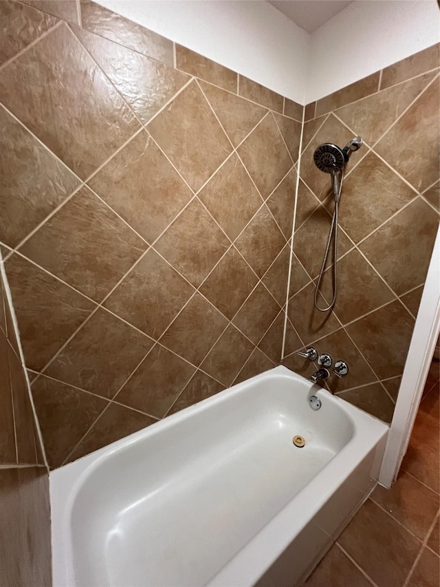 bathroom with shower / tub combination and tile patterned flooring