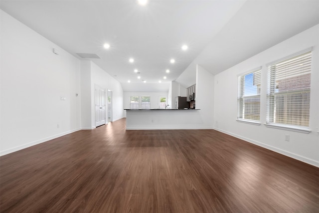 5431 Tourmaline Way, Brookshire, TX 77423 - unfurnished living room with dark wood finished floors, baseboards, and recessed lighting