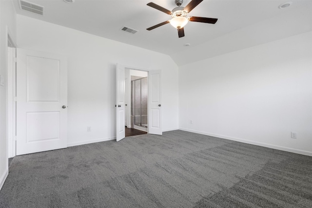 5431 Tourmaline Way, Brookshire, TX 77423 - unfurnished bedroom with dark colored carpet, baseboards, vaulted ceiling, and ceiling fan