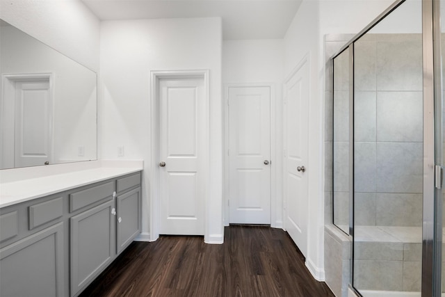 5431 Tourmaline Way, Brookshire, TX 77423 - full bathroom featuring wood finished floors, a shower stall, and vanity