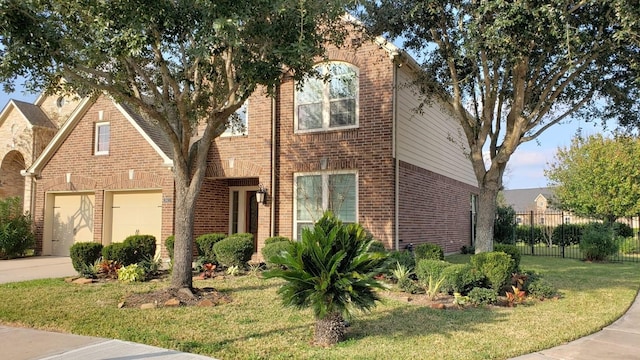 traditional home with brick siding and concrete driveway