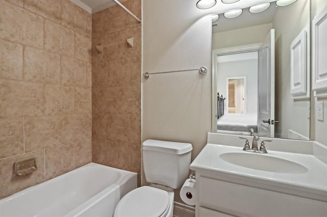 bathroom with toilet, vanity, and shower / washtub combination