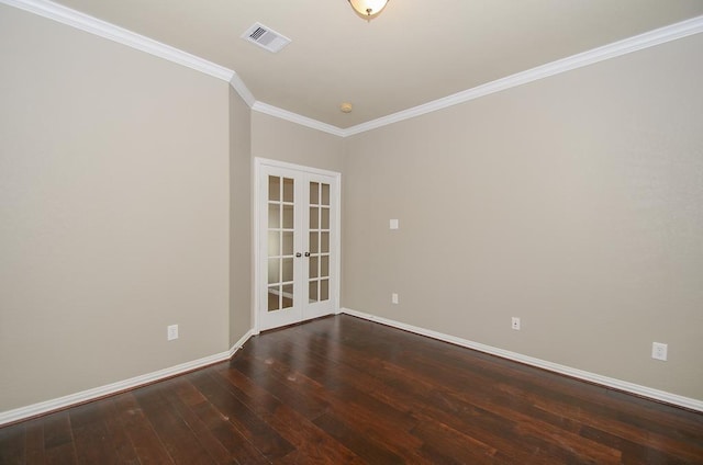 empty room featuring visible vents, baseboards, dark wood-type flooring, french doors, and crown molding