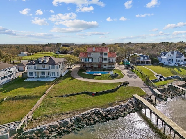 aerial view featuring a residential view and a water view