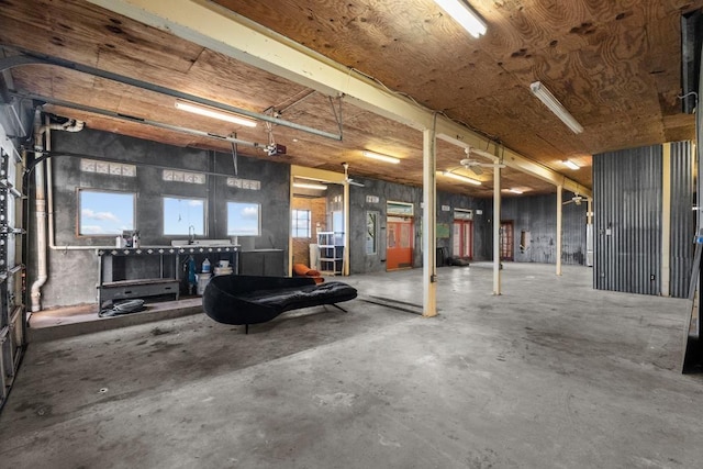 garage featuring a wall mounted air conditioner