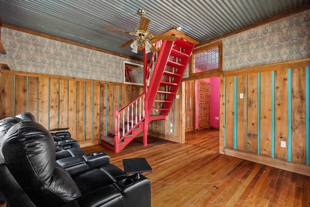 interior space with wallpapered walls and wood-type flooring